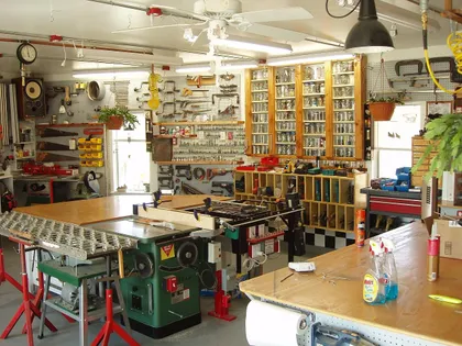 Woodworking shop with many tools on the walls